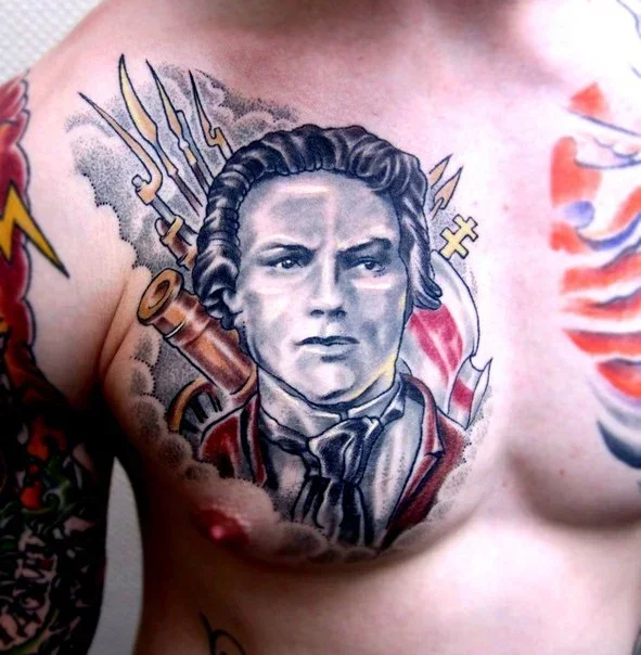 Татуировка с изображением Калиновского, отдавшего жизнь за идею, на груди молодого белоруса.