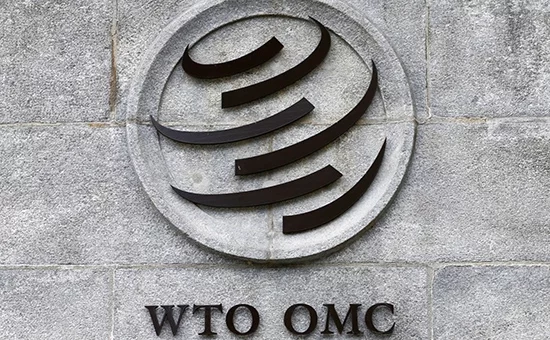 Эмблема Сусветнай гандлёвай арганізацыі на штаб-кватэры ў Жэневе. Фота: Reuters / Pixstream