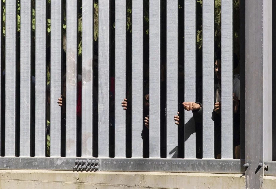 Мигранты на границе. Архивное фото, сделанное 28 мая 2023 года. AP Photo / Agnieszka Sadowska